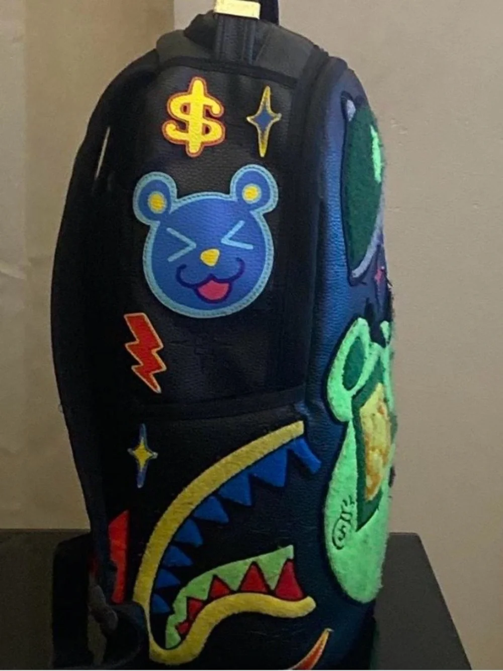 Black Backpack with Neon Green Bear Patch and Graphic Accents